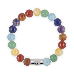 Top view of a 10mm 7 Chakra beaded stretch bracelet featuring Red Creek Jasper, Carnelian, Citrine, Green Aventurine, Aquamarine, Lapis Lazuli, & Amethyst crystal and silver stainless steel logo bead made by Voltlin