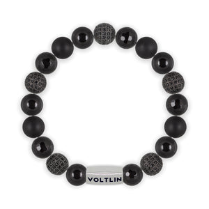 Top view of a 10mm Black Sirius beaded stretch bracelet featuring Smooth Onyx, Black Pave, Faceted Onyx, & Matte Onyx crystal and silver stainless steel logo bead made by Voltlin