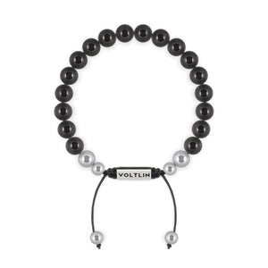 Top view of an 8mm Black Tourmaline beaded shamballa bracelet with silver stainless steel logo bead made by Voltlin