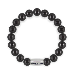 Top view of a 10mm Black Tourmaline beaded stretch bracelet with silver stainless steel logo bead made by Voltlin