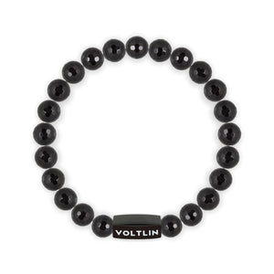 Top view of an 8mm Faceted Onyx crystal beaded stretch bracelet with black stainless steel logo bead made by Voltlin