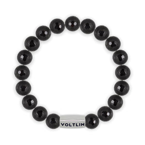 Top view of a 10mm Faceted Onyx beaded stretch bracelet with silver stainless steel logo bead made by Voltlin