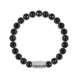 Top view of an 8mm Faceted Onyx beaded stretch bracelet with silver stainless steel logo bead made by Voltlin