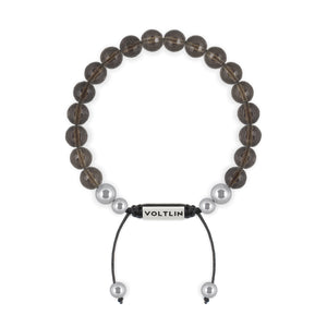 Top view of an 8mm Faceted Smoky Quartz beaded shamballa bracelet with silver stainless steel logo bead made by Voltlin