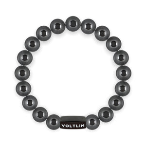 Top view of a 10mm Hematite crystal beaded stretch bracelet with black stainless steel logo bead made by Voltlin