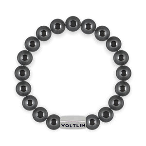 Top view of a 10mm Hematite beaded stretch bracelet with silver stainless steel logo bead made by Voltlin