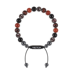 Top view of an 8mm Root Chakra crystal beaded shamballa bracelet with black stainless steel logo bead made by Voltlin
