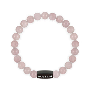 Top view of an 8mm Rose Quartz crystal beaded stretch bracelet with black stainless steel logo bead made by Voltlin
