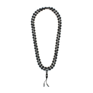 Top view of an 8 mm black sirius micro pave 108 bead mala from Voltlin