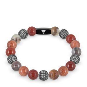 Front view of a 10 mm Sienna Sirius beaded stretch bracelet featuring Carnelian, Steel Pave, Smooth Botswana Agate, & Red Goldstone crystal and black stainless steel logo bead made by Voltlin