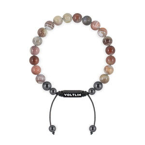 Top view of an 8mm Smooth Botswana Agate crystal beaded shamballa bracelet with black stainless steel logo bead made by Voltlin