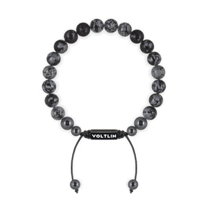 Top view of an 8mm Snowflake Obsidian crystal beaded shamballa bracelet with black stainless steel logo bead made by Voltlin