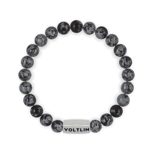 Top view of an 8mm Snowflake Obsidian beaded stretch bracelet with silver stainless steel logo bead made by Voltlin