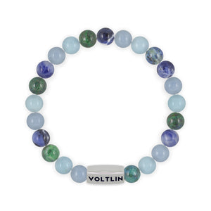 Top view of an 8mm Throat Chakra beaded stretch bracelet featuring Angelite, Aquamarine, Azurite, & Sodalite crystal and silver stainless steel logo bead made by Voltlin