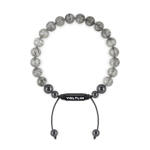 Top view of an 8mm Tourmalinated Quartz crystal beaded shamballa bracelet with black stainless steel logo bead made by Voltlin