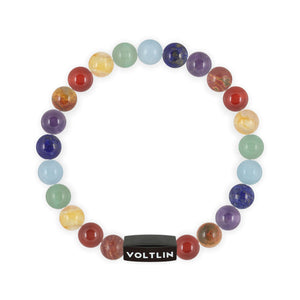 Top view of an 8mm 7 Chakra beaded stretch bracelet featuring Red Creek Jasper, Carnelian, Citrine, Green Aventurine, Aquamarine, Lapis Lazuli, & Amethyst crystal and black stainless steel logo bead made by Voltlin