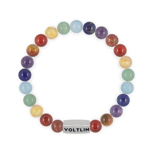 Top view of an 8mm 7 Chakra beaded stretch bracelet featuring Red Creek Jasper, Carnelian, Citrine, Green Aventurine, Aquamarine, Lapis Lazuli, & Amethyst crystal and silver stainless steel logo bead made by Voltlin