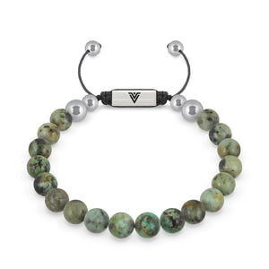 Front view of an 8mm African Turquoise beaded shamballa bracelet with silver stainless steel logo bead made by Voltlin