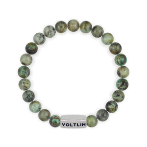 Top view of an 8 mm African Turquoise beaded stretch bracelet with silver stainless steel logo bead made by Voltlin
