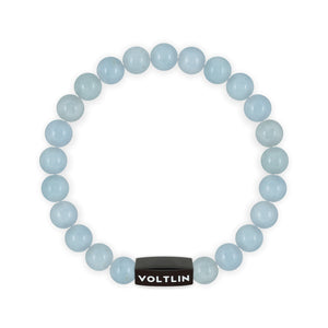 Top view of an 8mm Aquamarine crystal beaded stretch bracelet with black stainless steel logo bead made by Voltlin