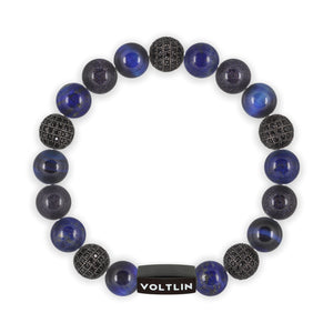 Top view of a 10 mm Blue Sirius beaded stretch bracelet featuring Blue Tiger’s Eye, Black Pave, Lapis Lazuli, & Blue Goldstone crystal and black stainless steel logo bead made by Voltlin