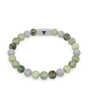 Front view of an 8mm Celadon Sirius beaded stretch bracelet featuring African Turquoise, Silver Pave, Jade, & Prehnite crystal and silver stainless steel logo bead made by Voltlin