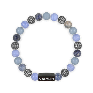 Top view of an 8 mm Cerulean Sirius beaded stretch bracelet featuring Blue Lace Agate, Steel Pave, Dumortierite, & Angelite crystal and black stainless steel logo bead made by Voltlin