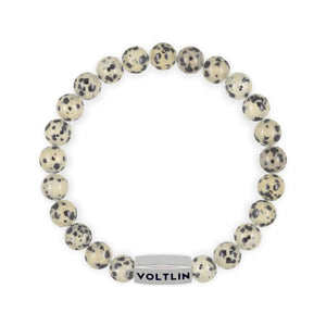 Top view of an 8mm Dalmatian Jasper beaded stretch bracelet with silver stainless steel logo bead made by Voltlin