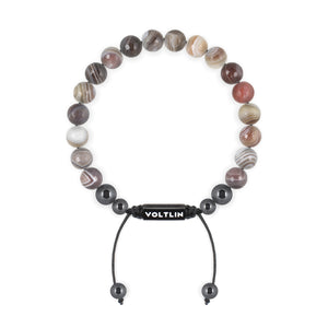 Top view of an 8mm Faceted Botswana Agate crystal beaded shamballa bracelet with black stainless steel logo bead made by Voltlin