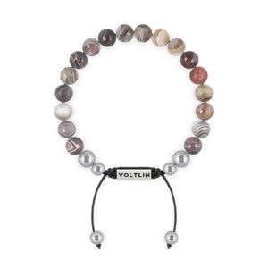 Top view of an 8mm Faceted Botswana Agate beaded shamballa bracelet with silver stainless steel logo bead made by Voltlin