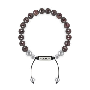 Top view of an 8mm Faceted Garnet beaded shamballa bracelet with silver stainless steel logo bead made by Voltlin