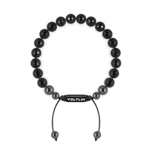 Top view of an 8mm Faceted Onyx crystal beaded shamballa bracelet with black stainless steel logo bead made by Voltlin
