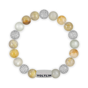 Top view of a 10mm Golden Sirius beaded stretch bracelet featuring Rutilated Quartz, Silver Pave, Moonstone, & Citrine crystal and silver stainless steel logo bead made by Voltlin