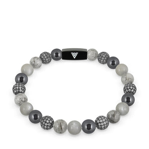 Front view of an 8mm Gray Sirius beaded stretch bracelet featuring Hematite, Steel Pave, Tourmalinated Quartz, & Moonstone crystal and black stainless steel logo bead made by Voltlin