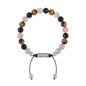 Top view of an 8mm Leo Zodiac beaded shamballa bracelet featuring Faceted Onyx, Yellow Tiger’s Eye, & Rose Quartz crystal and silver stainless steel logo bead made by Voltlin