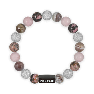 Top view of a 10 mm Mauve Sirius beaded stretch bracelet featuring Rhodonite, Silver Pave, Faceted Botswana Agate, & Rose Quartz crystal and black stainless steel logo bead made by Voltlin