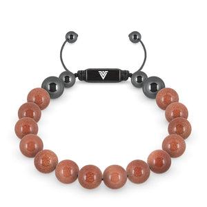 Front view of a 10mm Red Goldstone crystal beaded shamballa bracelet with black stainless steel logo bead made by Voltlin