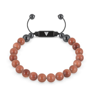 Front view of an 8mm Red Goldstone crystal beaded shamballa bracelet with black stainless steel logo bead made by Voltlin