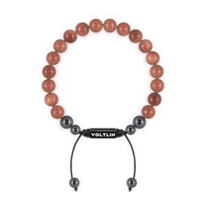 Top view of an 8mm Red Goldstone crystal beaded shamballa bracelet with black stainless steel logo bead made by Voltlin