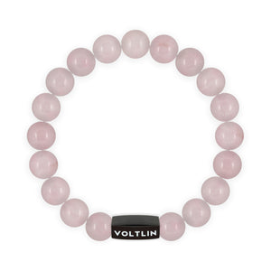 Top view of a 10mm Rose Quartz crystal beaded stretch bracelet with black stainless steel logo bead made by Voltlin