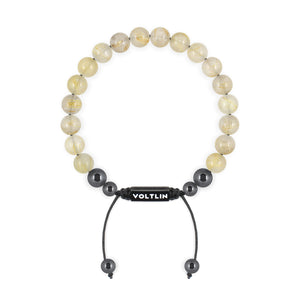 Top view of an 8mm Rutilated Quartz crystal beaded shamballa bracelet with black stainless steel logo bead made by Voltlin