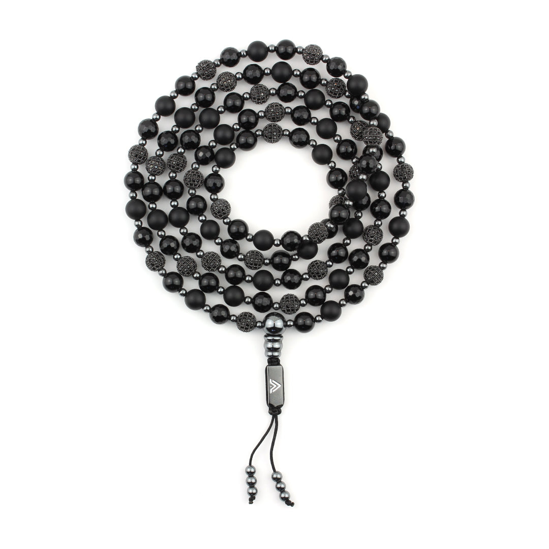Top view of an 8 mm black sirius micro pave 108 bead wrap mala from Voltlin