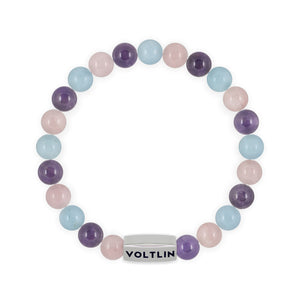 Top view of an 8mm Serenity beaded stretch bracelet featuring Rose Quartz, Amethyst, & Aquamarine crystal and silver stainless steel logo bead made by Voltlin