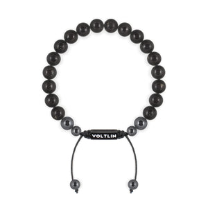 Top view of an 8mm Shungite crystal beaded shamballa bracelet with black stainless steel logo bead made by Voltlin