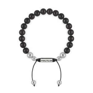 Top view of an 8mm Shungite beaded shamballa bracelet with silver stainless steel logo bead made by Voltlin
