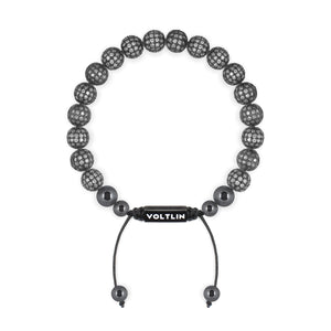 Top view of an 8mm Steel Pave crystal beaded shamballa bracelet with black stainless steel logo bead made by Voltlin