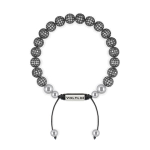 Top view of an 8mm Steel Pave beaded shamballa bracelet with silver stainless steel logo bead made by Voltlin
