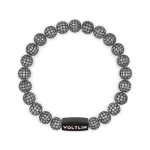 Top view of an 8mm Steel Pave crystal beaded stretch bracelet with black stainless steel logo bead made by Voltlin