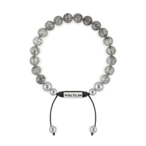 Top view of an 8mm Tourmalinated Quartz beaded shamballa bracelet with silver stainless steel logo bead made by Voltlin